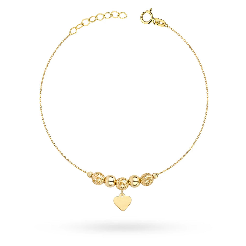 Zlatý náramek s průřezovými korálky