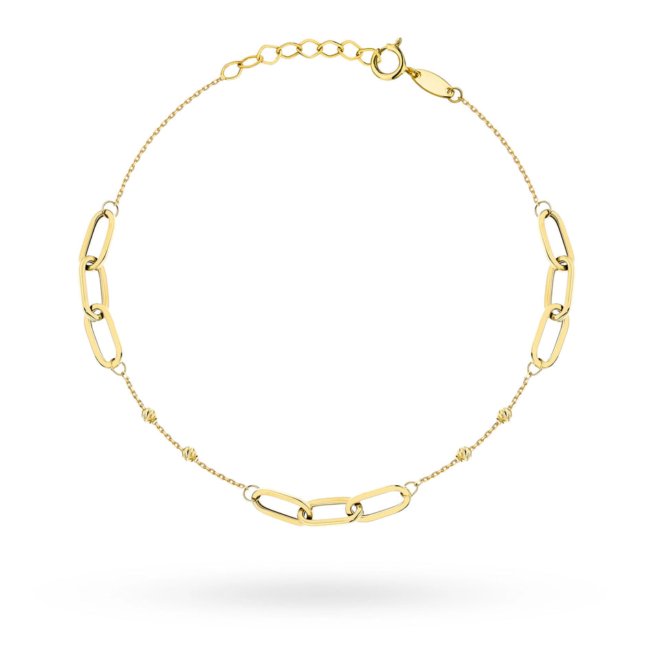 Zlatý náramek s korálky