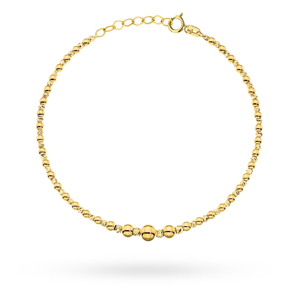 Zlatý náramek s korálky