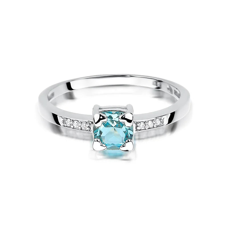 Zlatý prsten s topazem 0,70 ct a diamanty