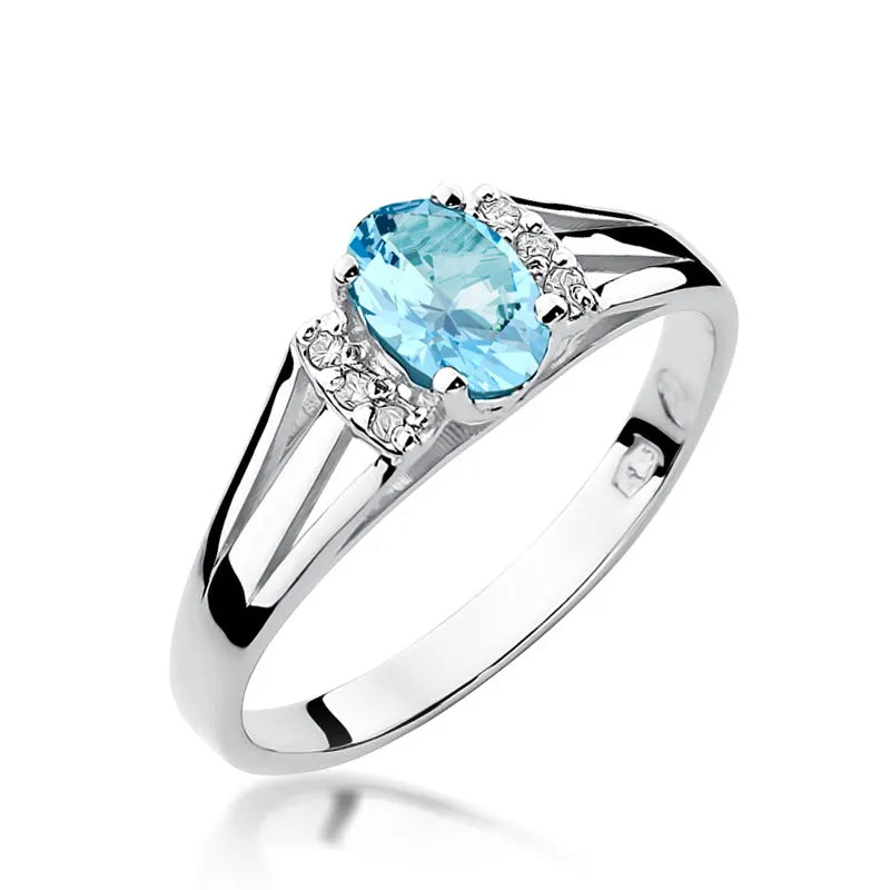 Zlatý prsteň s 0,50 ct topásom a diamantmi