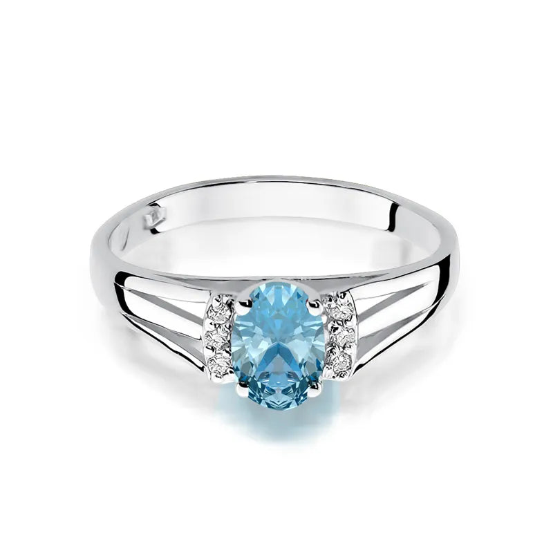 Zlatý prsteň s 0,50 ct topásom a diamantmi