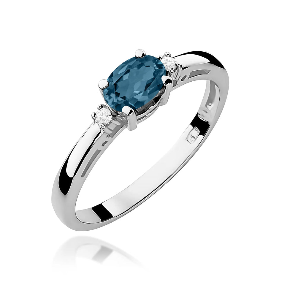 Zlatý prsten s 0,50ct topazem London Blue a 0,029ct diamanty