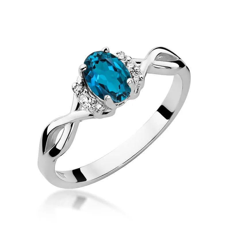 Zlatý prsten s 0,50ct topazem London Blue a 0,052ct diamanty