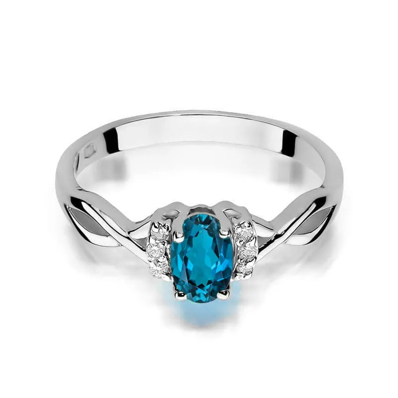 Zlatý prsten s 0,50ct topazem London Blue a 0,052ct diamanty