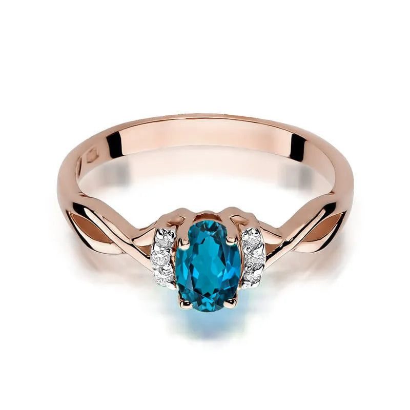 Zlatý prsten s 0,50ct topazem London Blue a 0,052ct diamanty