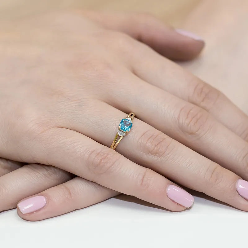 Goldring mit 0,70 ct Topas und 0,01 ct Diamanten