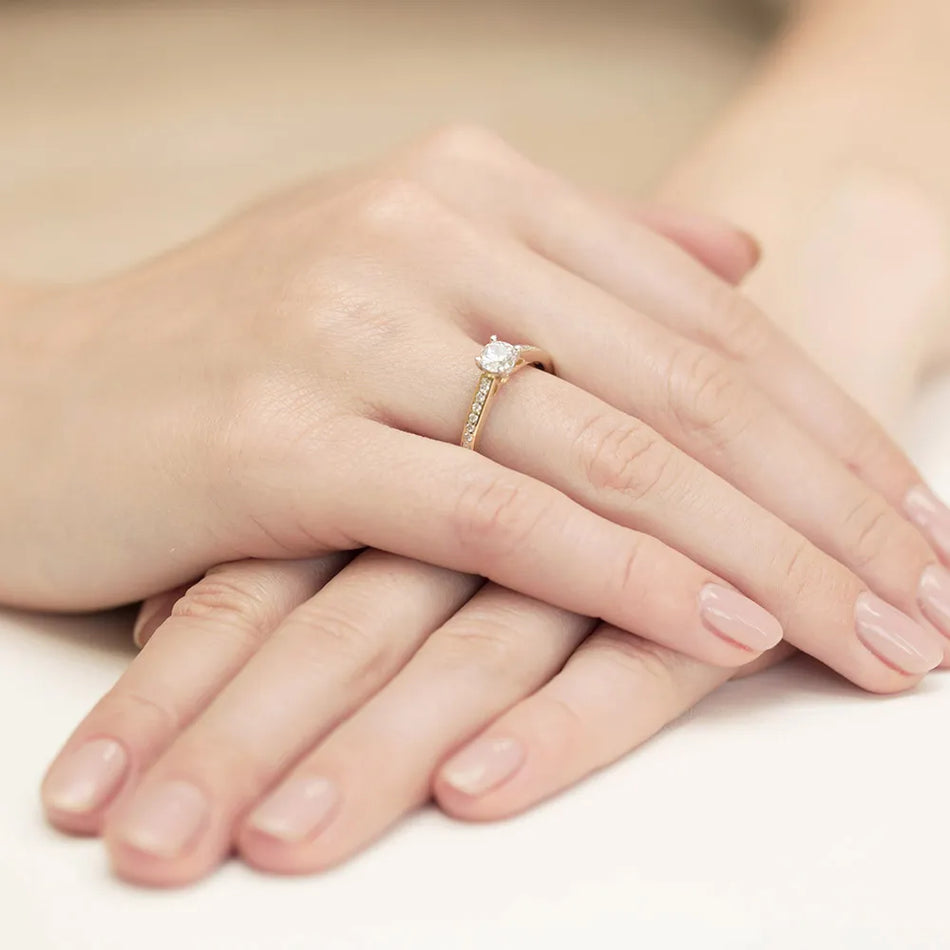 Goldring mit 0,50 ct und 0,12 ct Diamanten