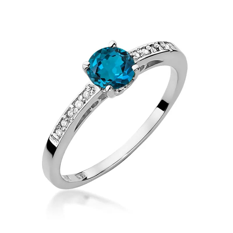 Zlatý prsten s 0,50ct topazem London Blue a 0,05ct diamanty