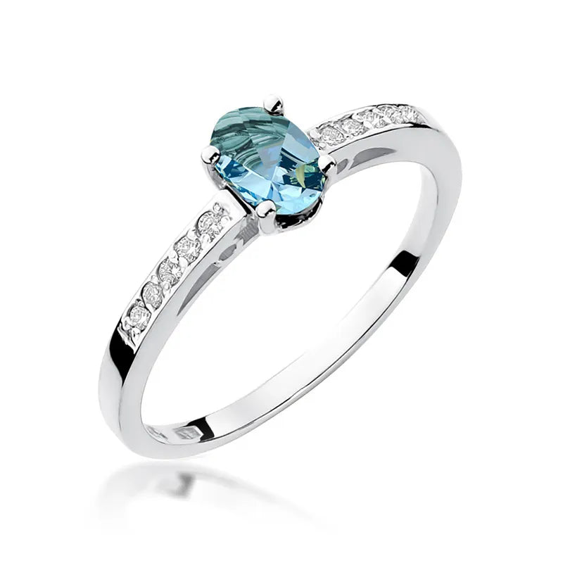 Zlatý prsten s topazem 0,50 ct a diamanty 0,05 ct