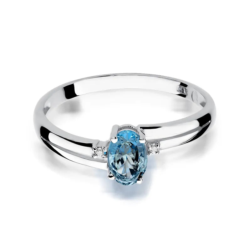 Zlatý prsten s topazem 0,50 ct a diamanty 0,029 ct