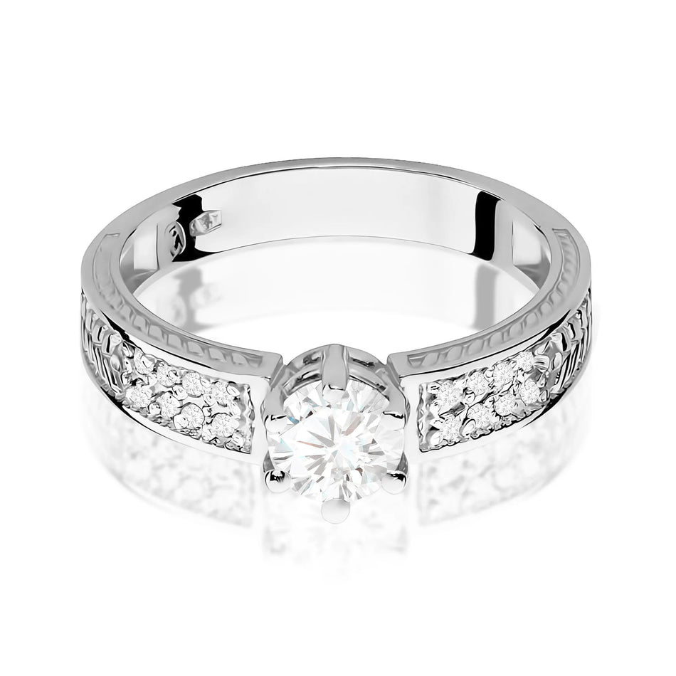 Goldring mit 0,60 ct weißem Saphir und 0,08 ct Diamanten