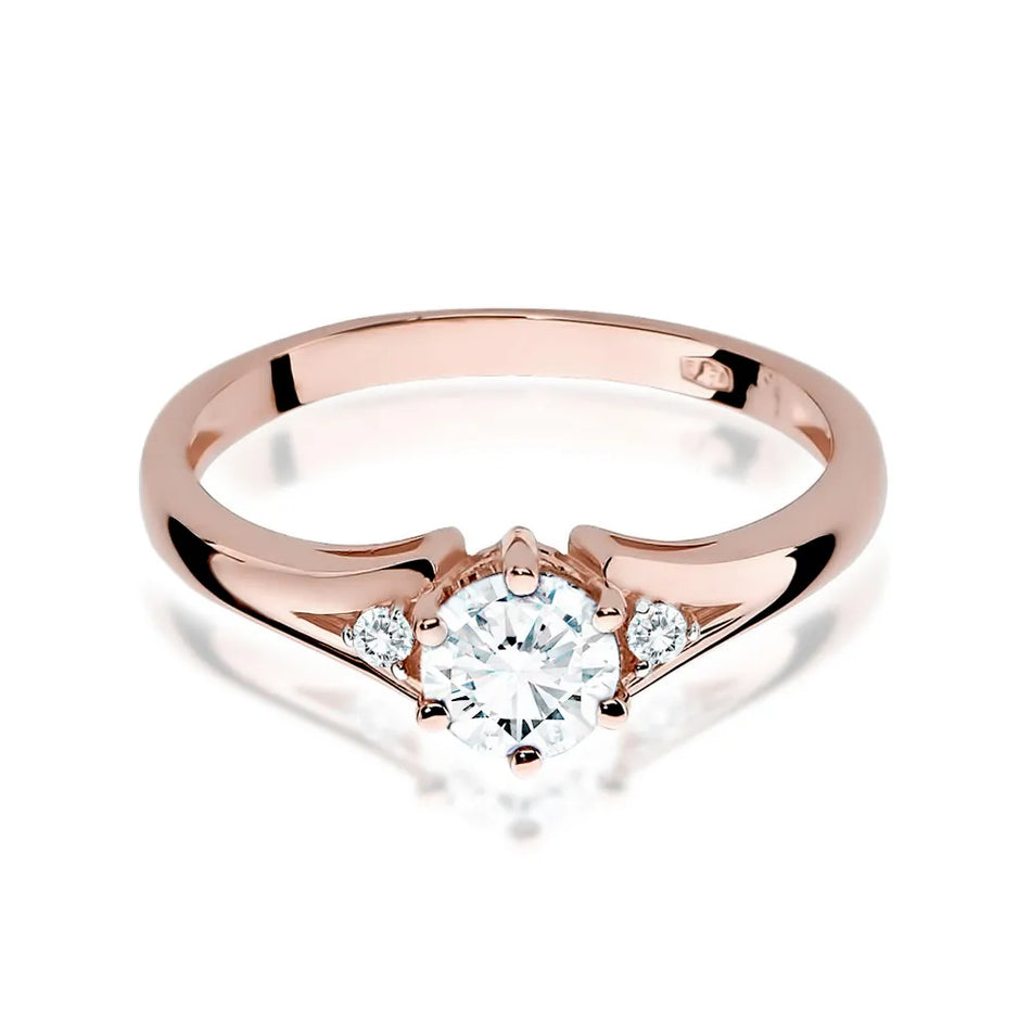 Goldring mit 0,60 ct weißem Saphir und Diamanten