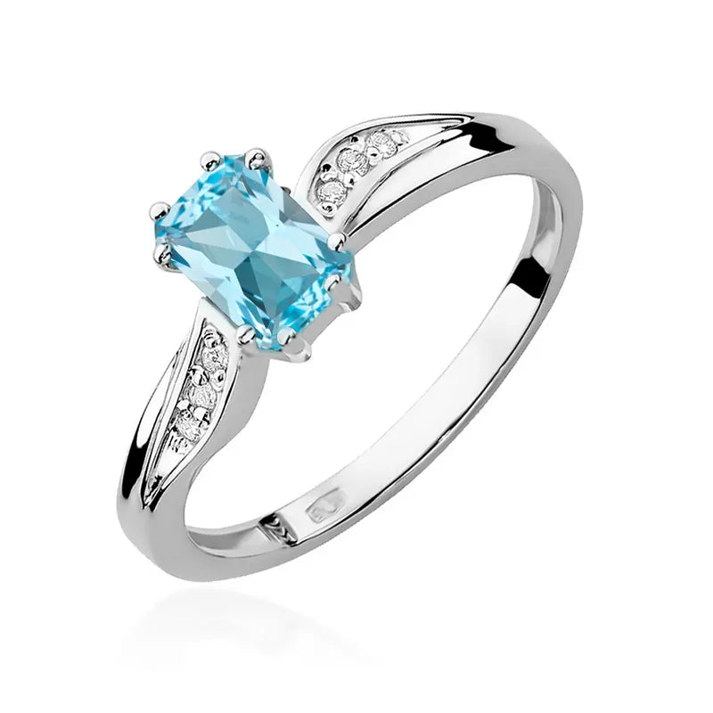 Zlatý prsten s topazem 0,65 ct a diamanty 0,03 ct