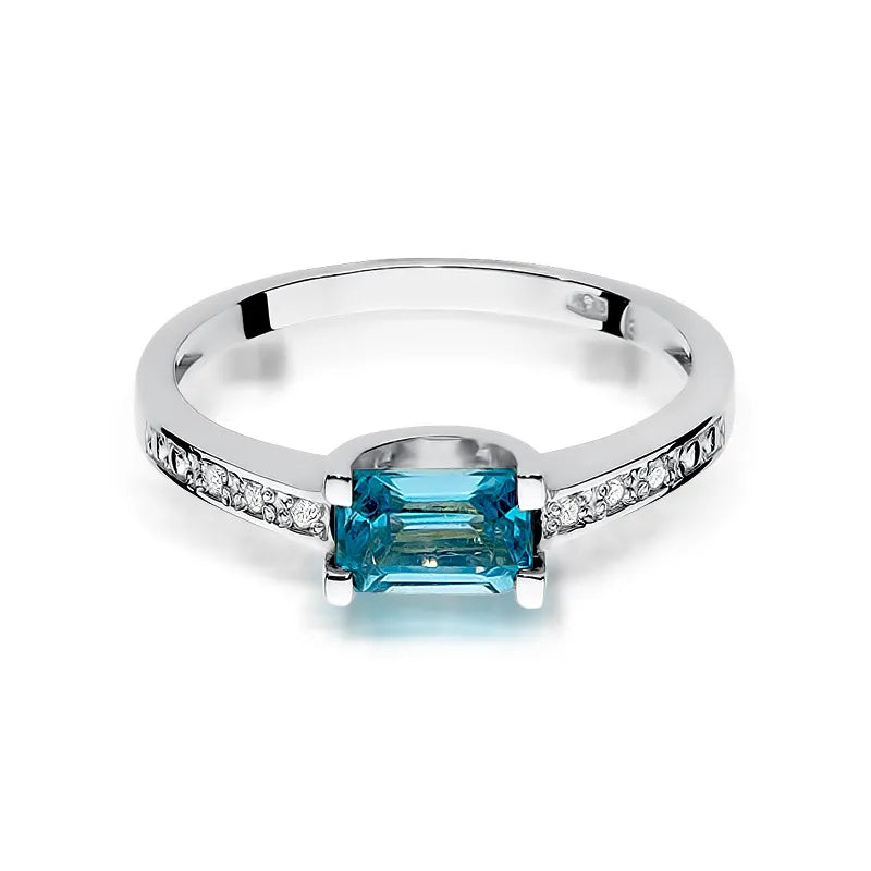 Zlatý prsten s topazem 0,65 ct a diamanty 0,03 ct