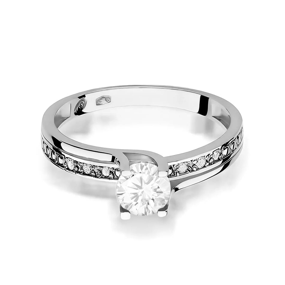 Zlatý prsten s 0,60ct bílým safírem a 0,03ct diamanty