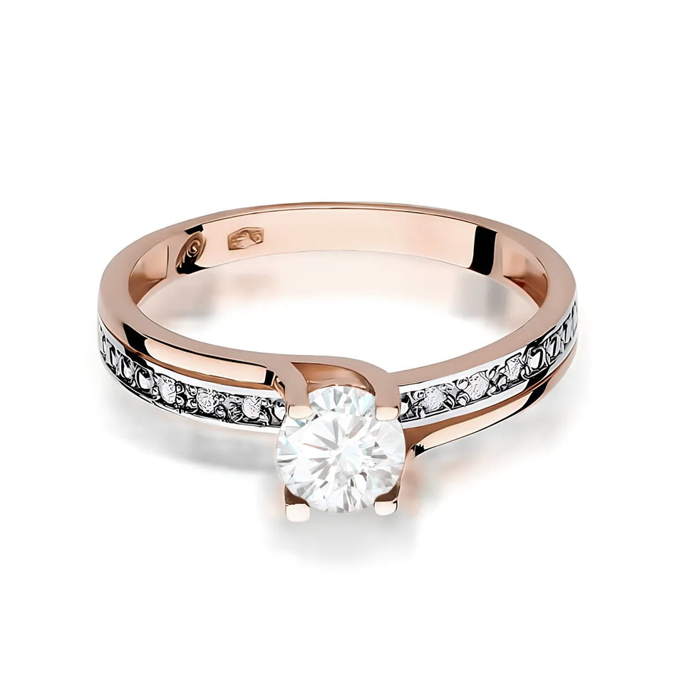 Zlatý prsten s 0,60ct bílým safírem a 0,03ct diamanty