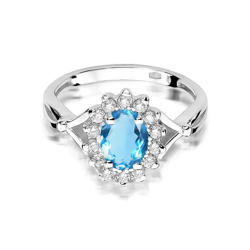 Zlatý prsten s topazem 0,50 ct a diamanty 0,12 ct