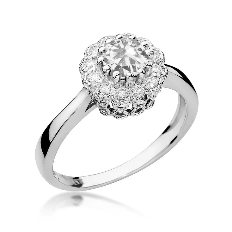 Goldring mit 0,60 ct weißem Saphir und 0,174 ct Diamanten