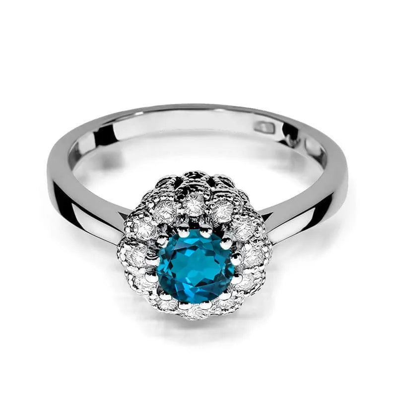 Zlatý prsten s 0,50ct topazem London Blue a 0,174ct diamanty