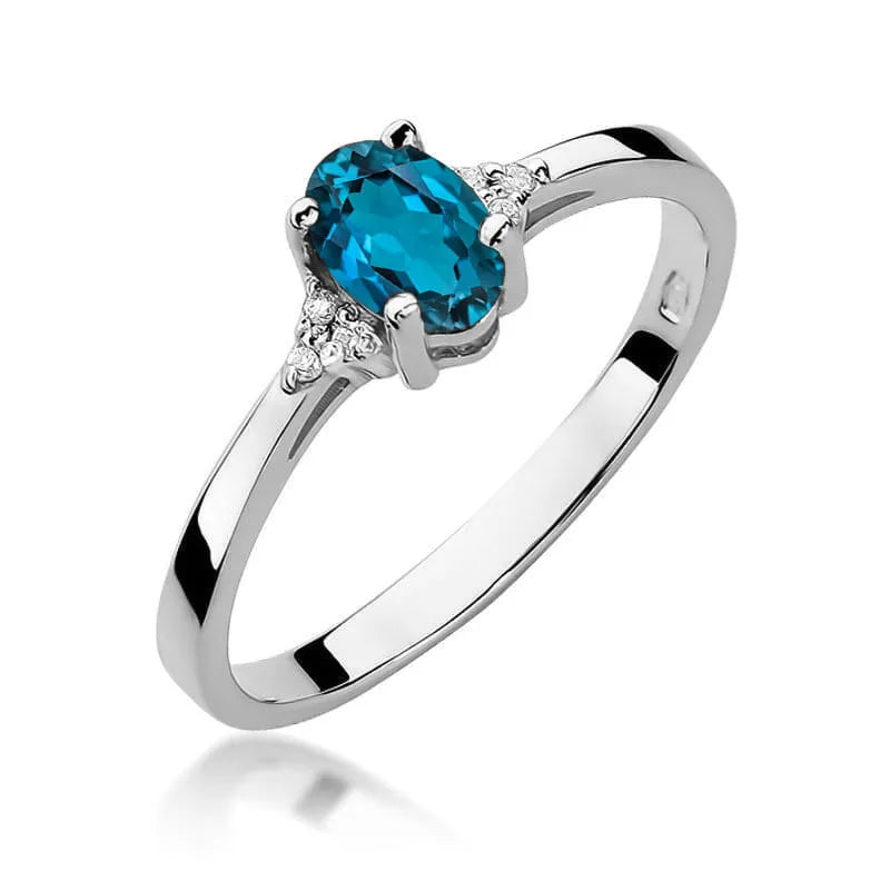 Zlatý prsten s 0,50ct topazem London Blue a 0,052ct diamanty