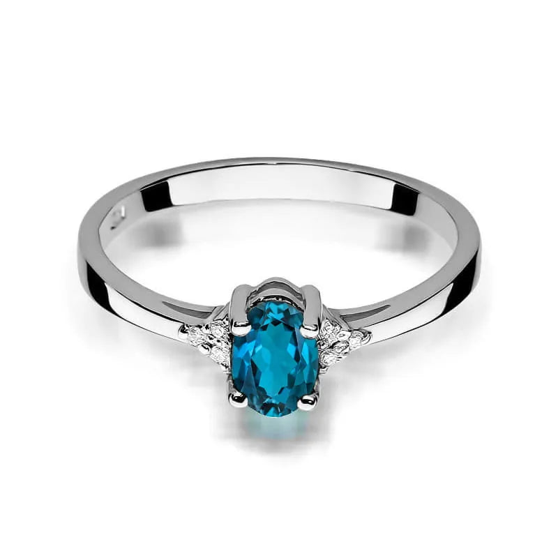 Zlatý prsten s 0,50ct topazem London Blue a 0,052ct diamanty