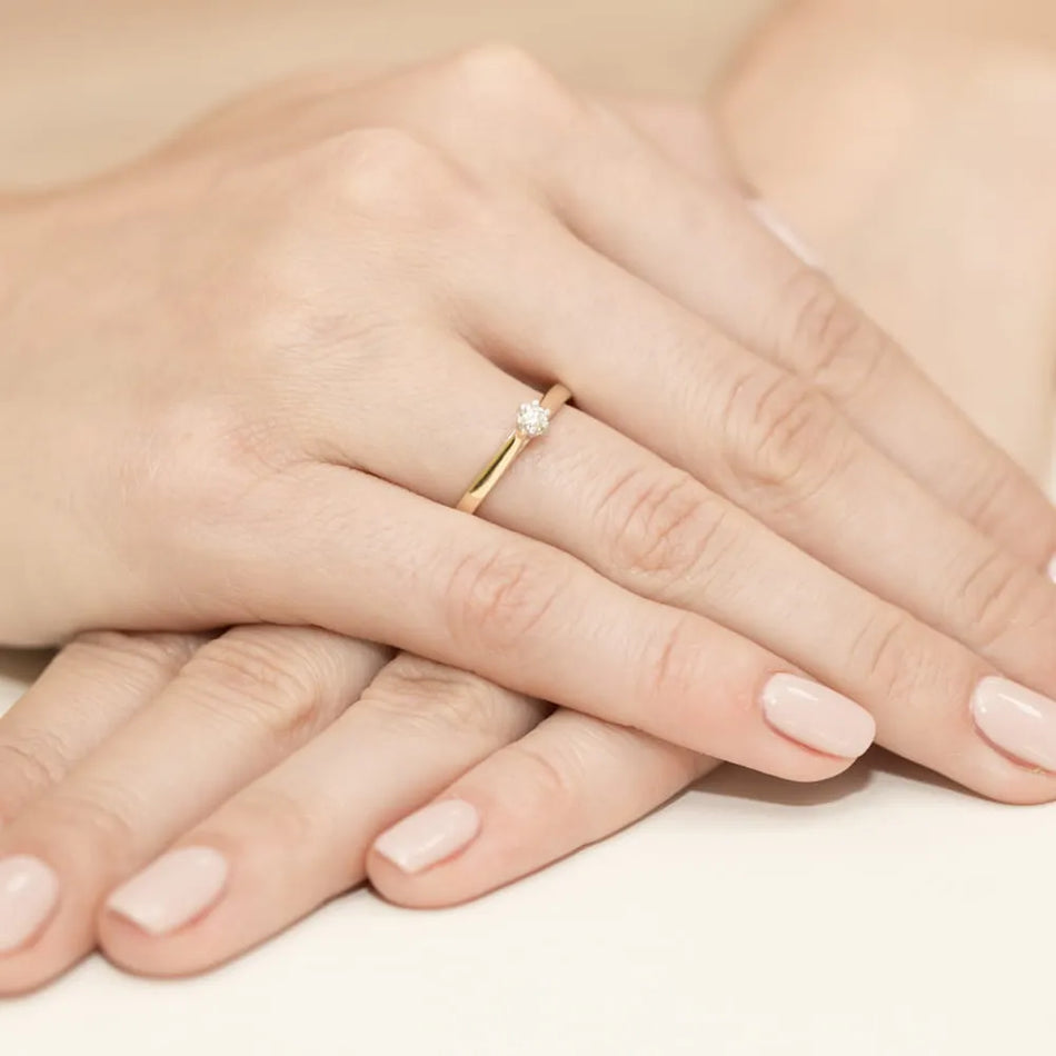 Zlatý prsteň s diamantom 0,10 ct