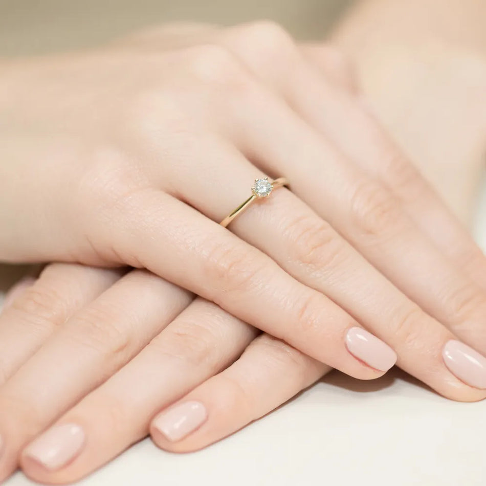 Zlatý prsteň s diamantom 0,15 ct