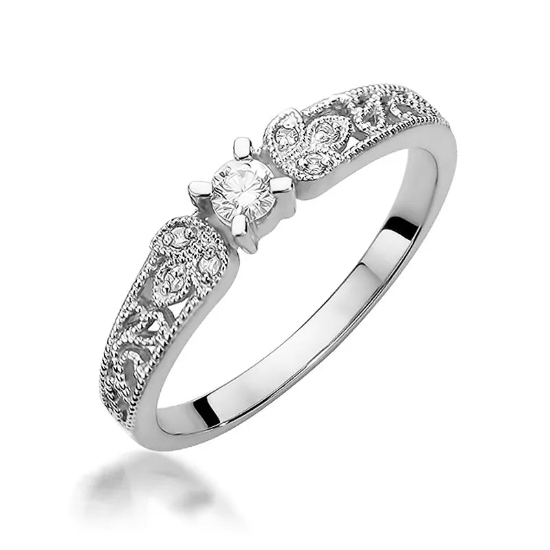 Zlatý prsteň s diamantmi 0,10 ct a 0,03 ct