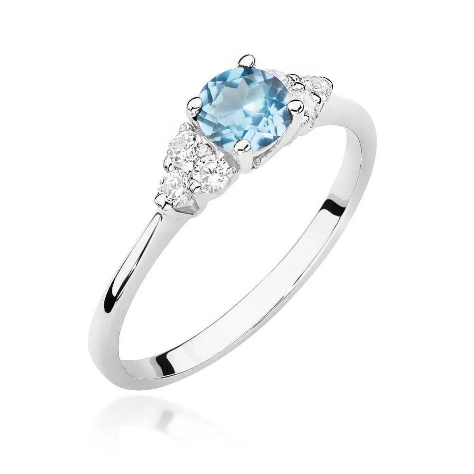 Zlatý prsten s topazem 0,50 ct a diamanty 0,18 ct