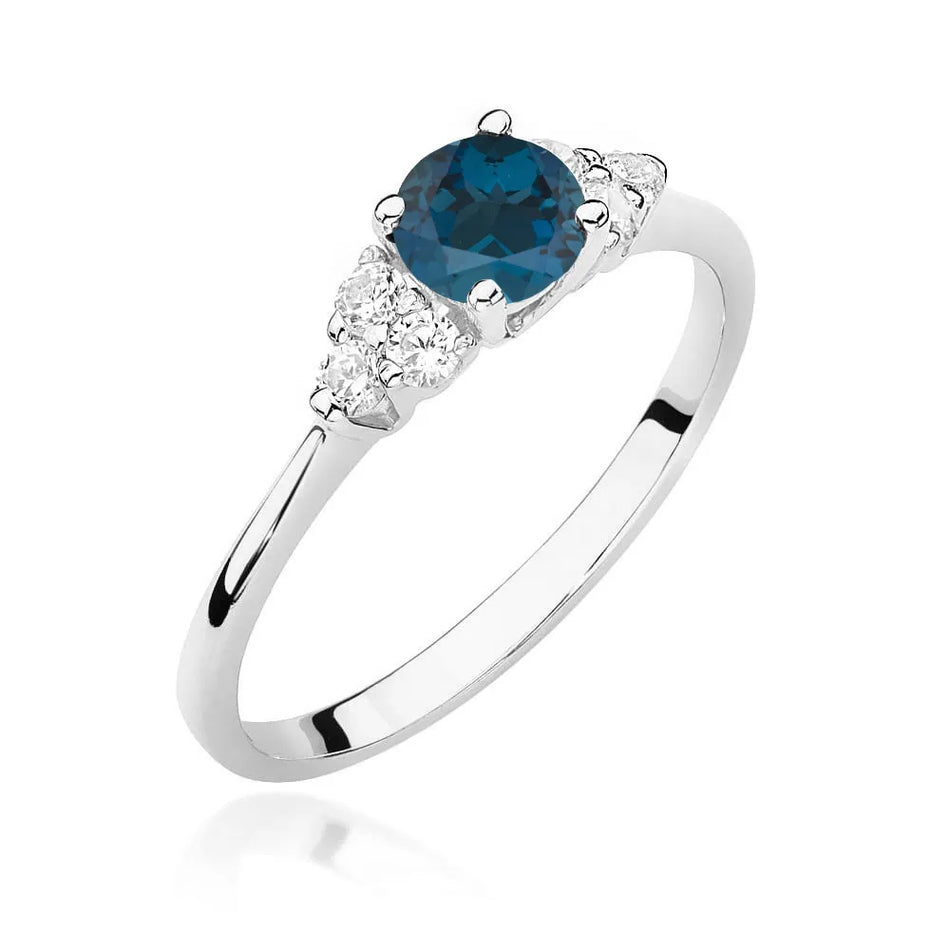 Zlatý prsten s 0,50ct topazem London Blue a 0,18ct diamanty