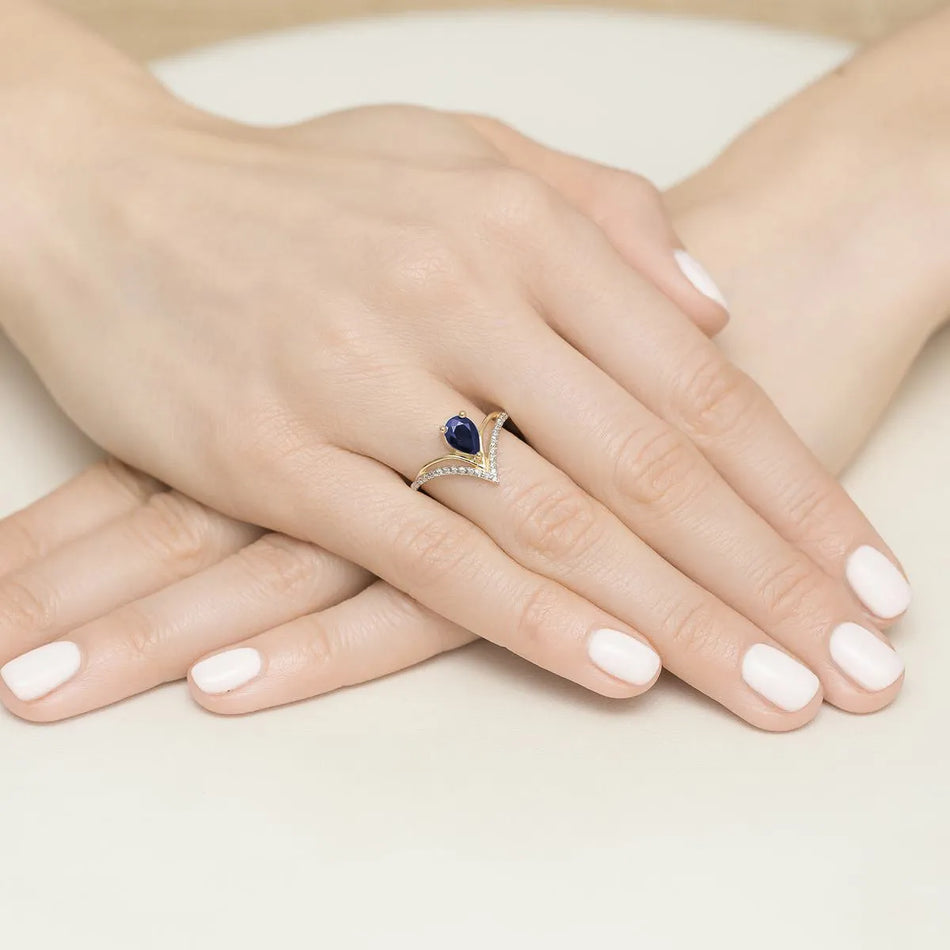 Goldring mit 0,60 ct Saphir und 0,125 ct Diamanten