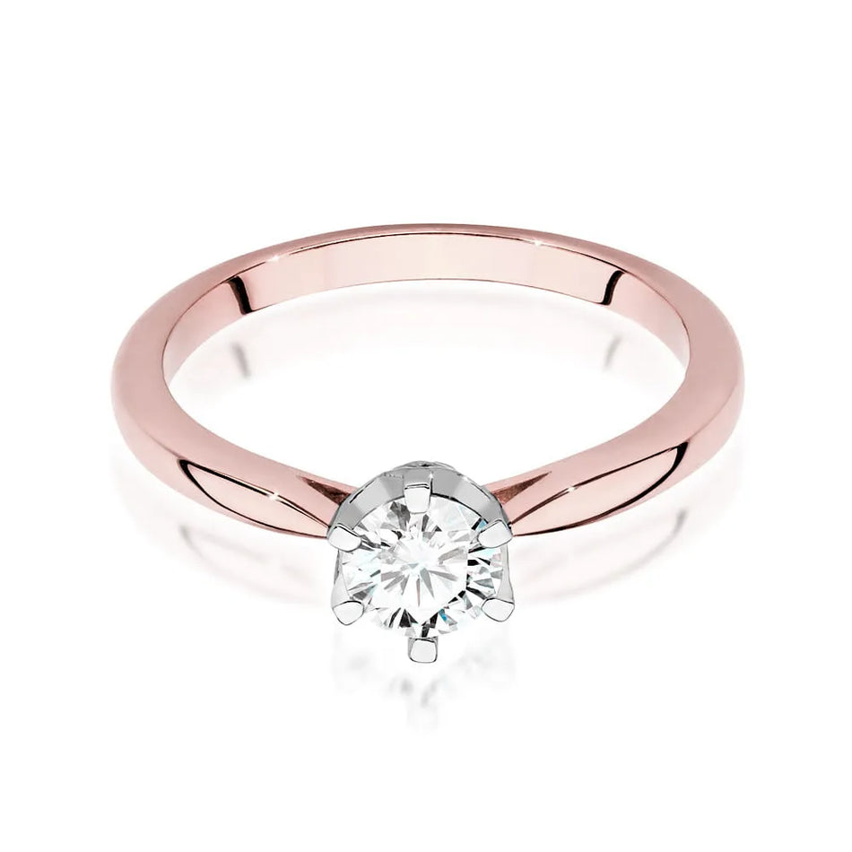 Zlatý prsteň s diamantom 0,50 ct a postrannými diamantmi 0,06 ct