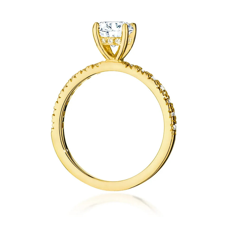 Gold Ring with 0.70ct Diamond and 0.263ct Sideline Diamonds