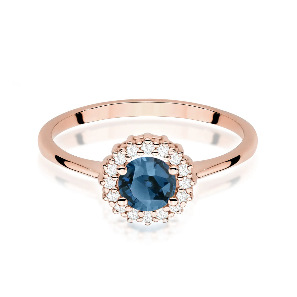 Goldring mit 0,50 ct London Blue Topas und Diamanten Blume