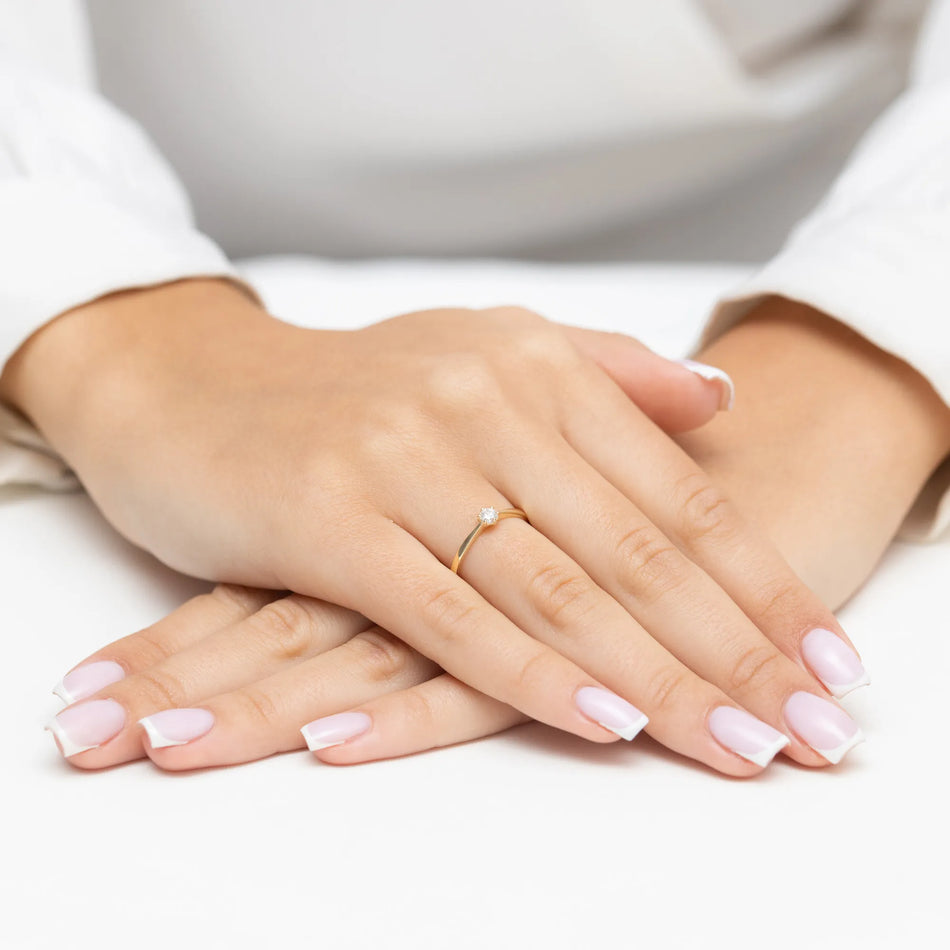 Zlatý prsteň s diamantom 0,15 ct