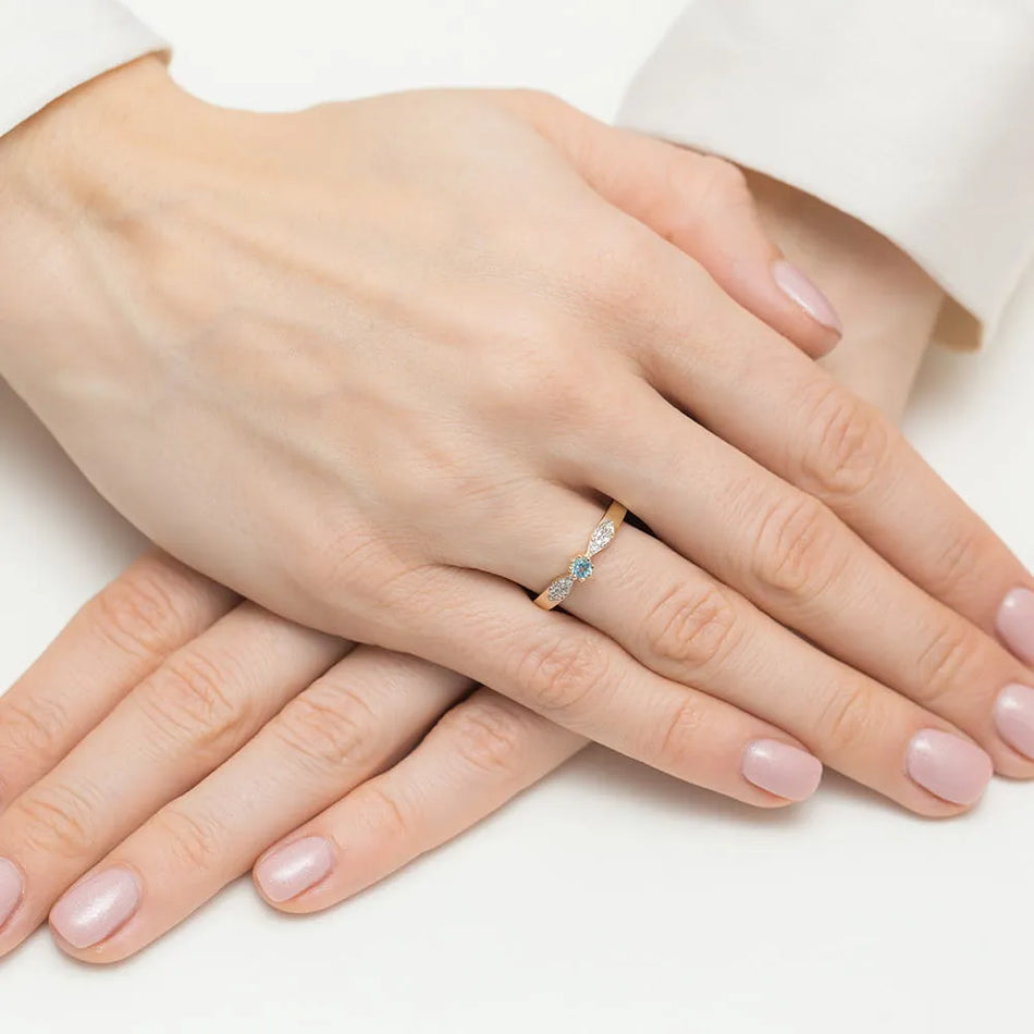 Goldring mit 0,15 ct Topas und 0,06 ct Diamanten