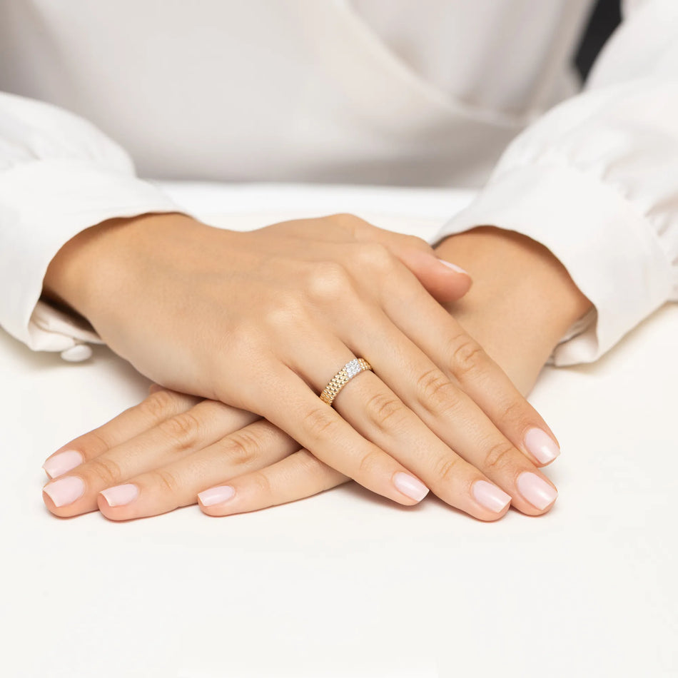 Zlatý prsteň s diamantmi 0,1305 ct