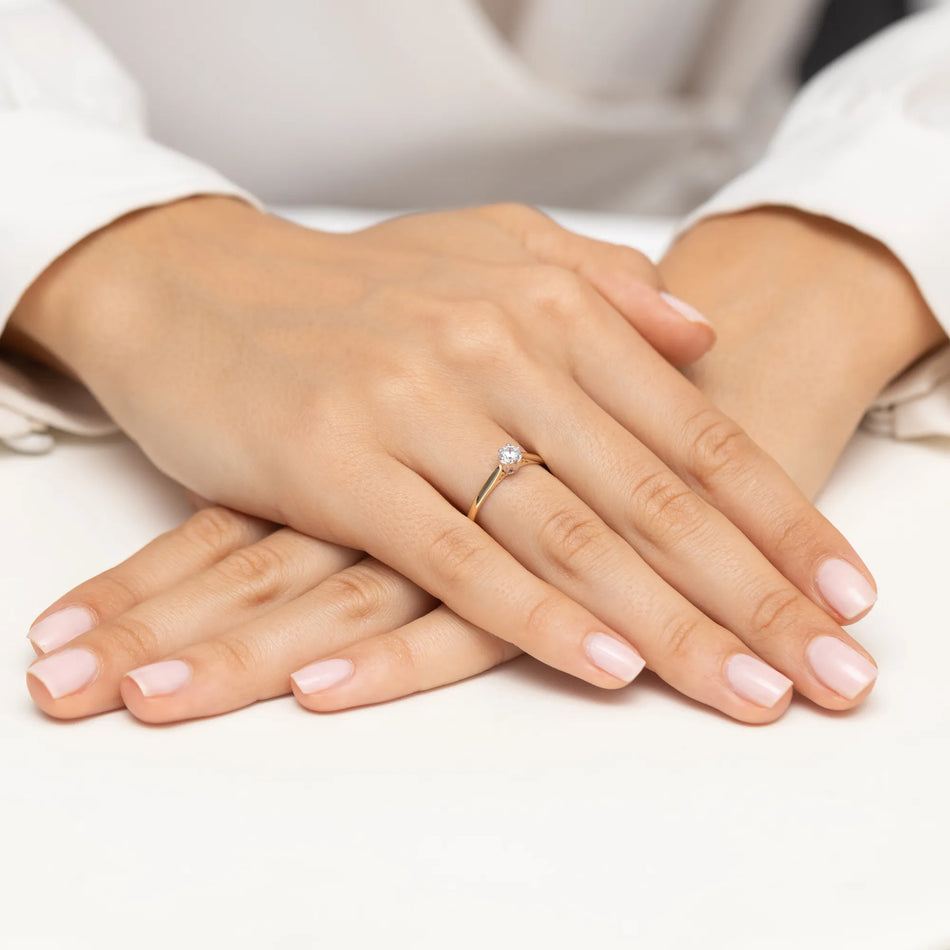 Zlatý prsteň s diamantom 0,18 ct