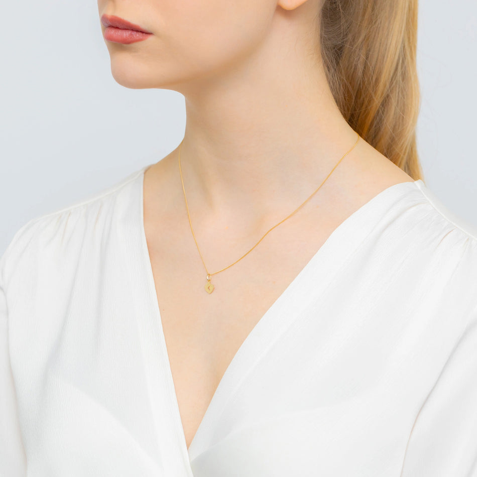 Zlatý přívěsek dětské nožičky