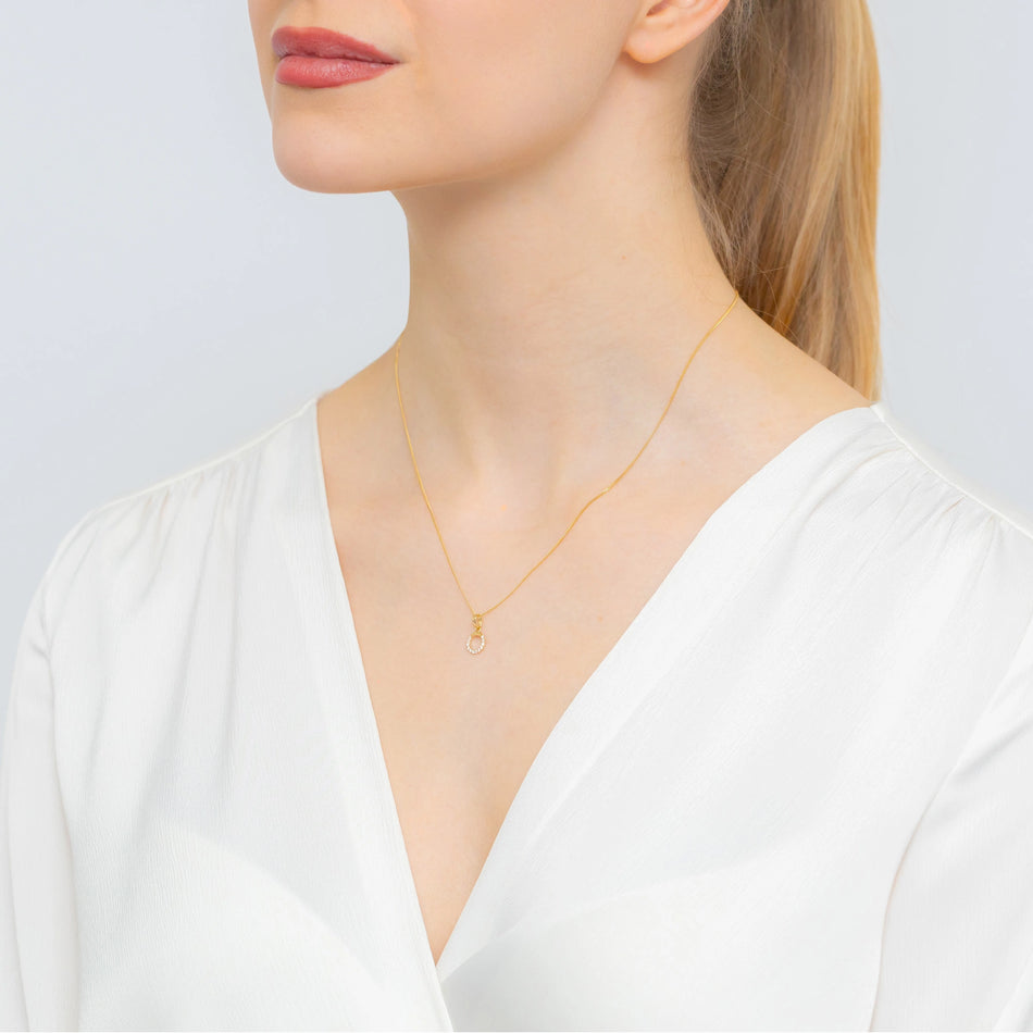 Zlatý prsteň s príveskom so zirkónmi