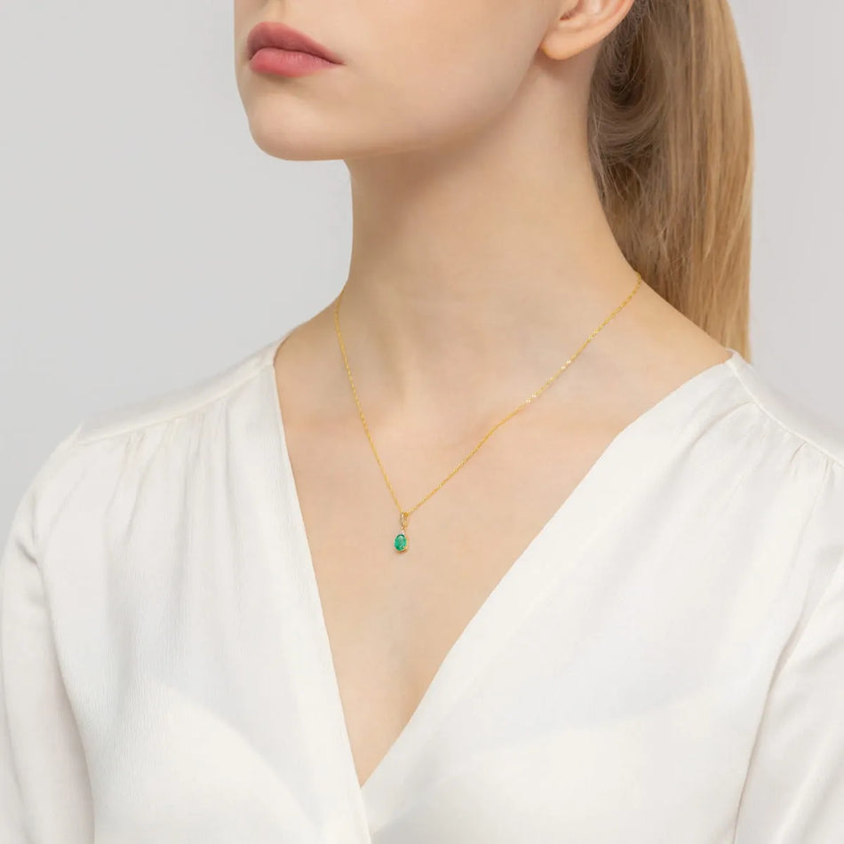 Zlatý prívesok s 0,80 ct smaragdom a 0,026 ct diamantmi