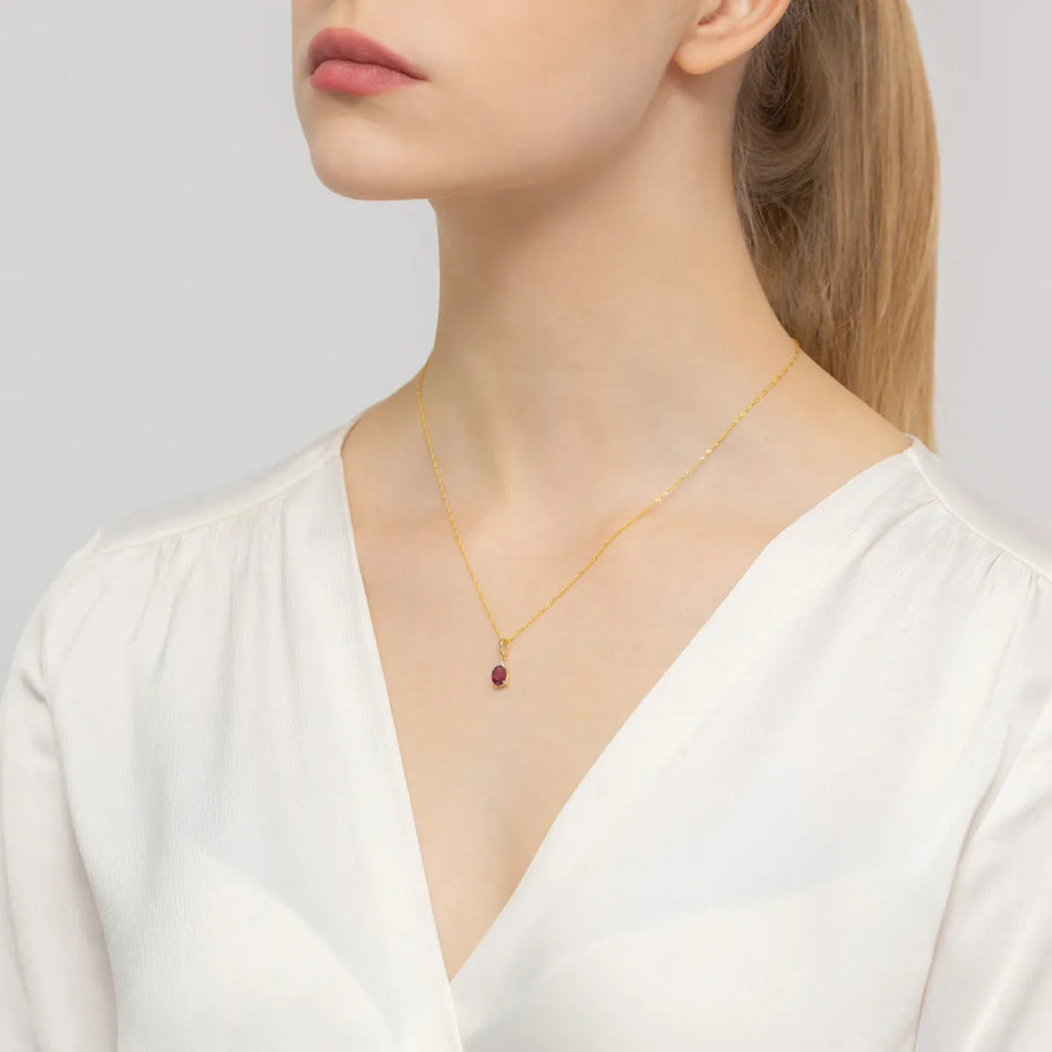 Zlatý prívesok s 1.00ct rubínom a 0.026ct diamantmi
