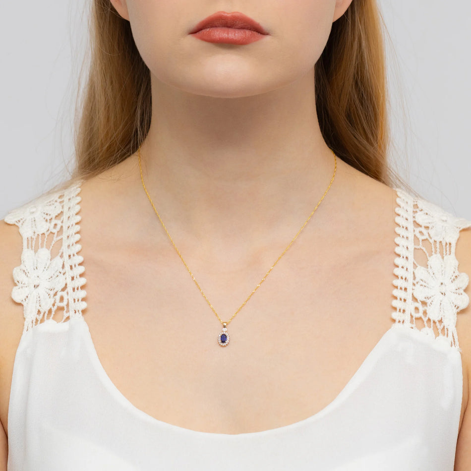 Zlatý prívesok so zafírom 0,70 ct a diamantmi 0,095 ct