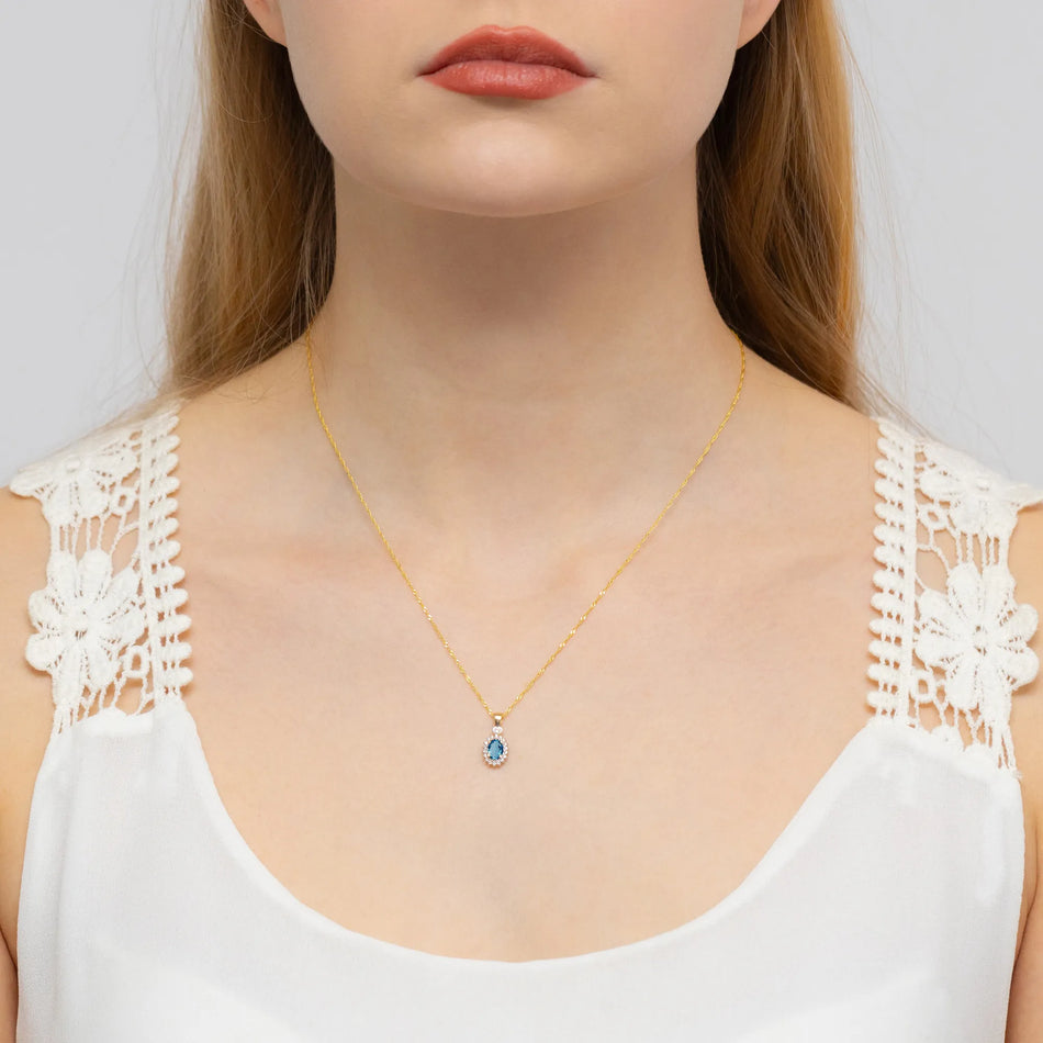 Zlatý přívěsek s 0,50ct topazem London Blue a 0,095ct diamanty