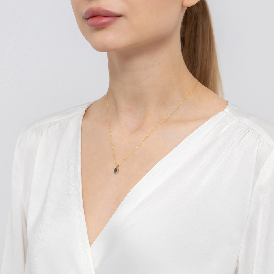 Zlatý přívěsek s 0,50ct topazem London Blue a 0,08ct diamanty