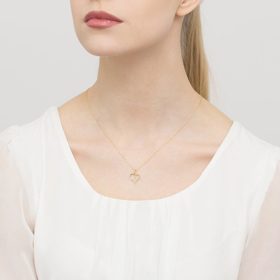 Zlatý přívěsek se zirkony srdce