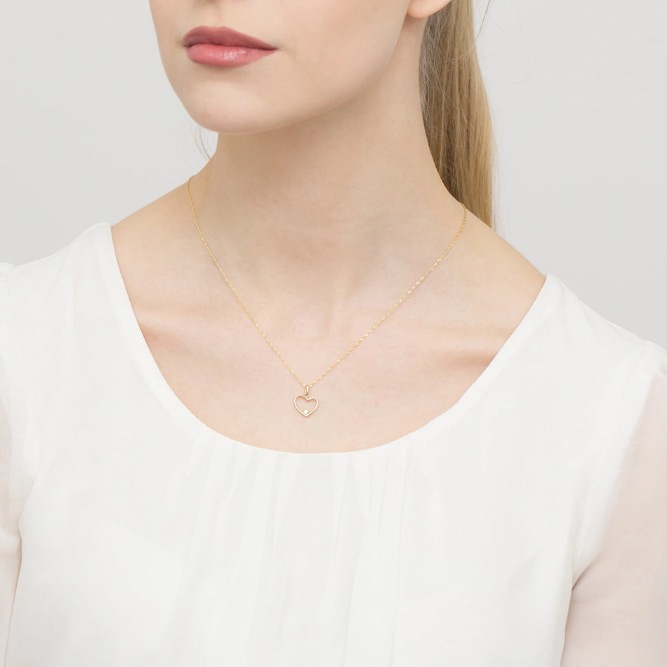 Zlatý přívěsek se zirkony srdce