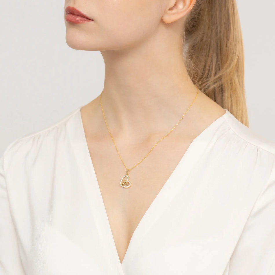 Zlatý přívěsek se zirkony Tři srdce ve srdci